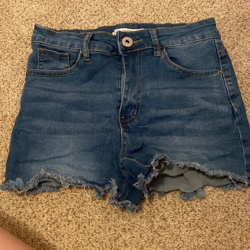 Small Jean shorts, good for summer, light blue.